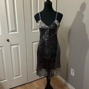 Lingerie, hand dyed, pattern of an x-ray lower half of a skeleton.